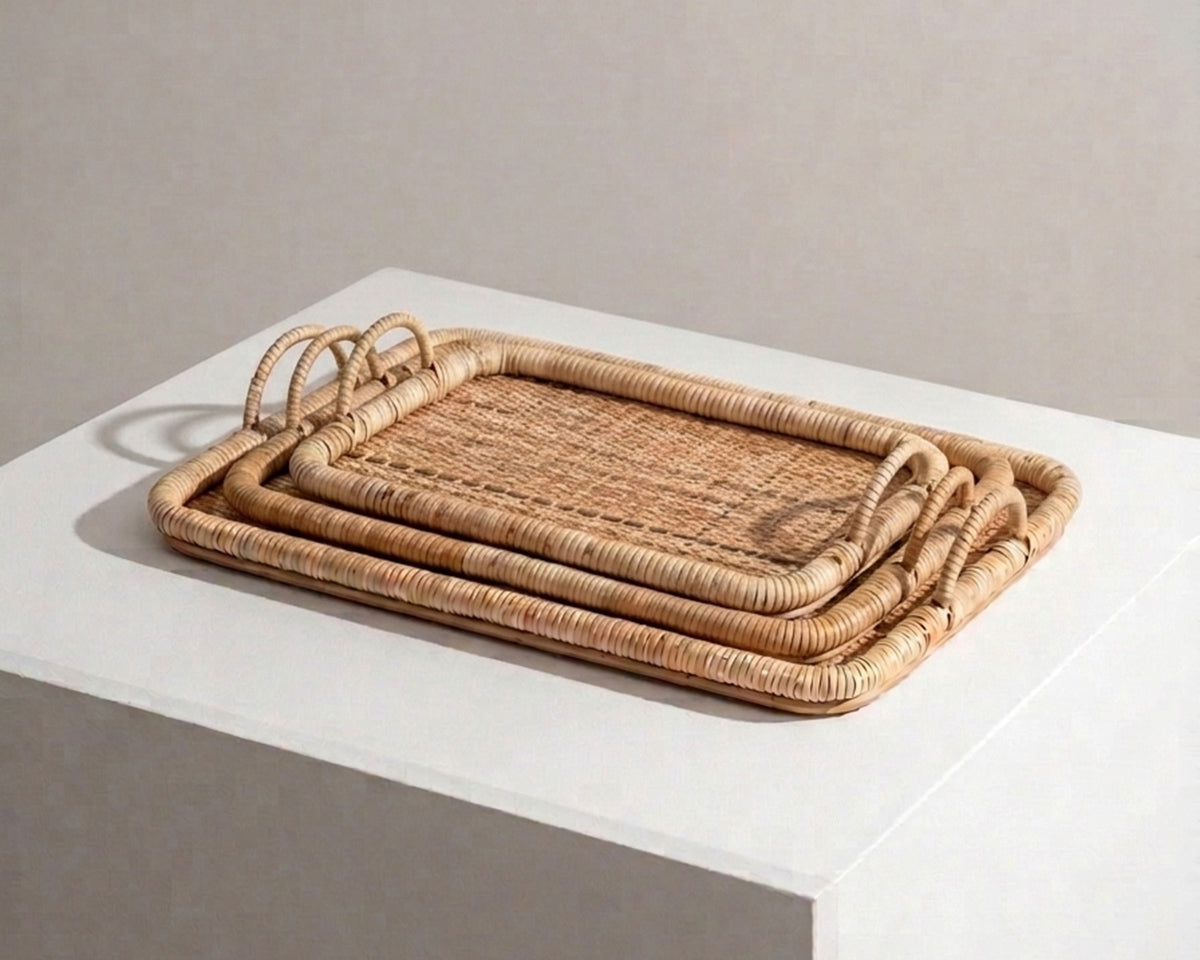 Set of three natural rattan trays stacked together - Anboise