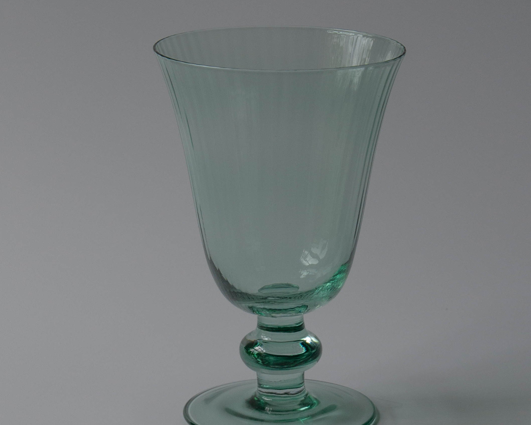 Set of six delicately pleated luxury green wine glasses | Anboise Glassware
