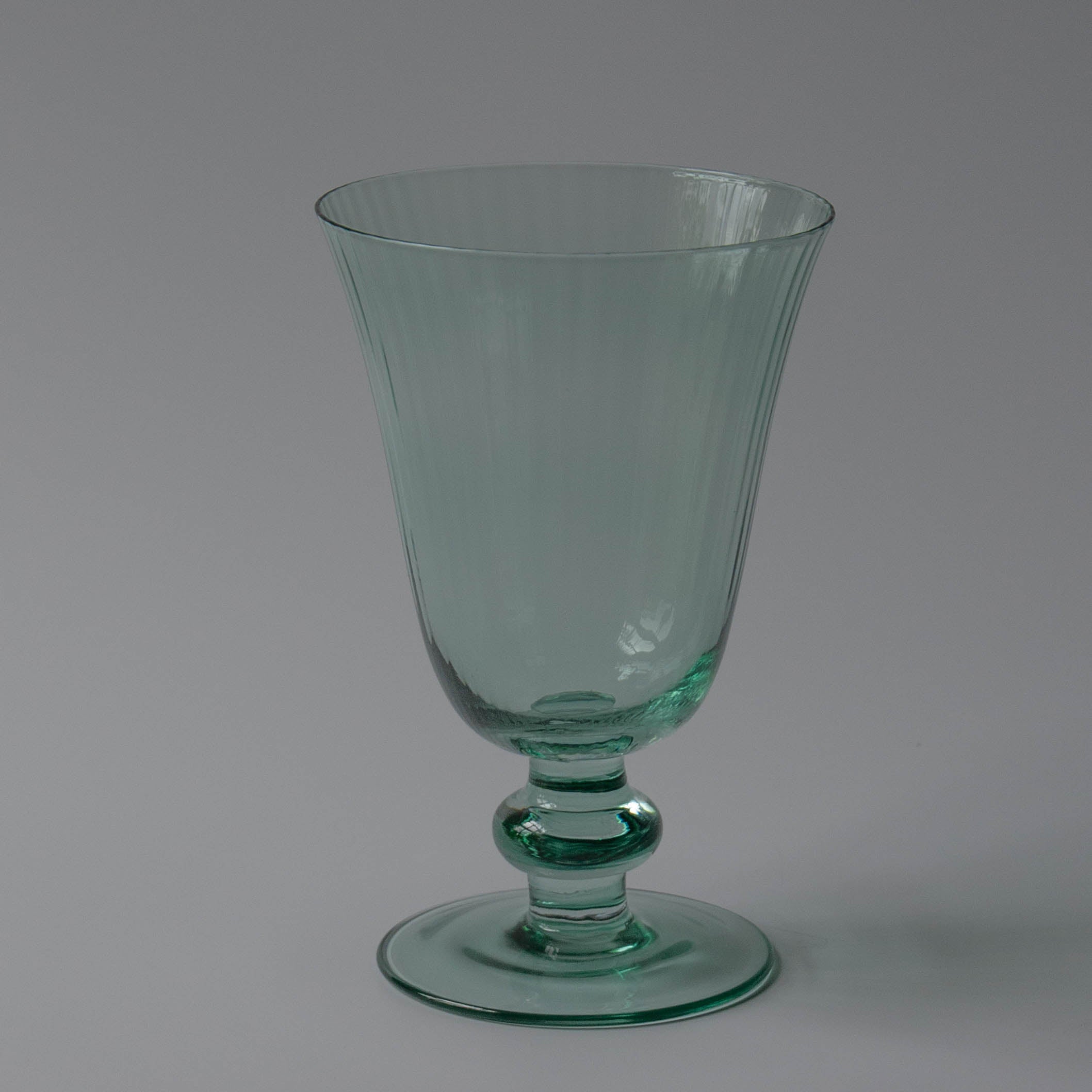 Set of six delicately pleated luxury green wine glasses | Anboise Glassware