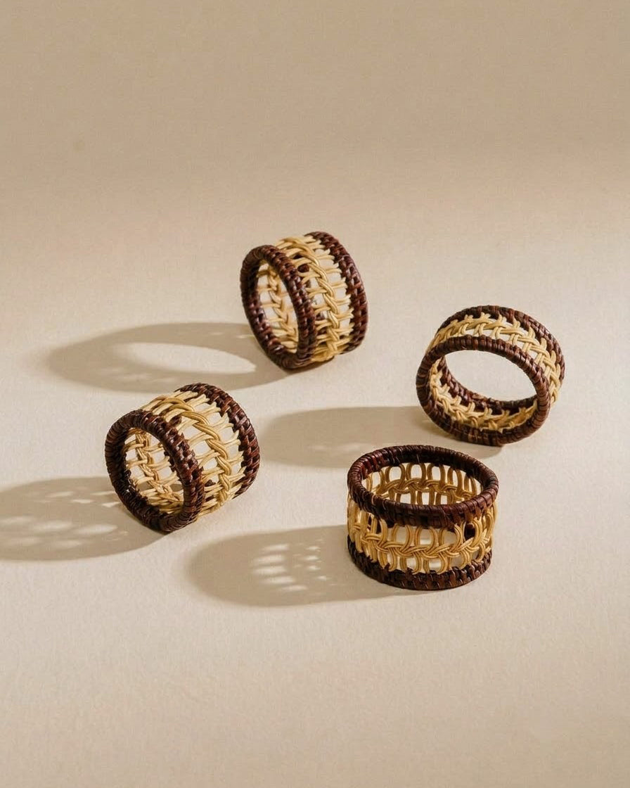 Four woven napkin rings with burgundy accents | Anboise