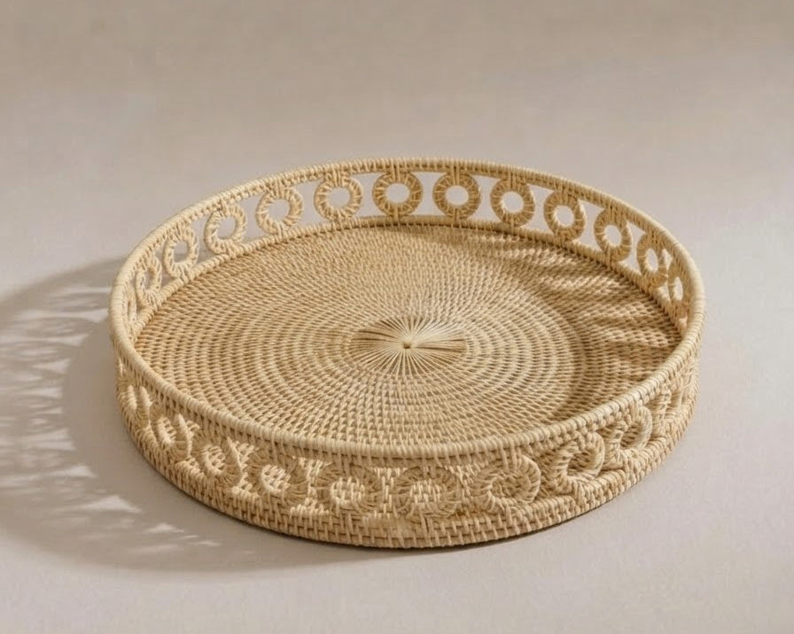 Melina handmade rattan tray with woven detailing and raised circular edge | Anboise