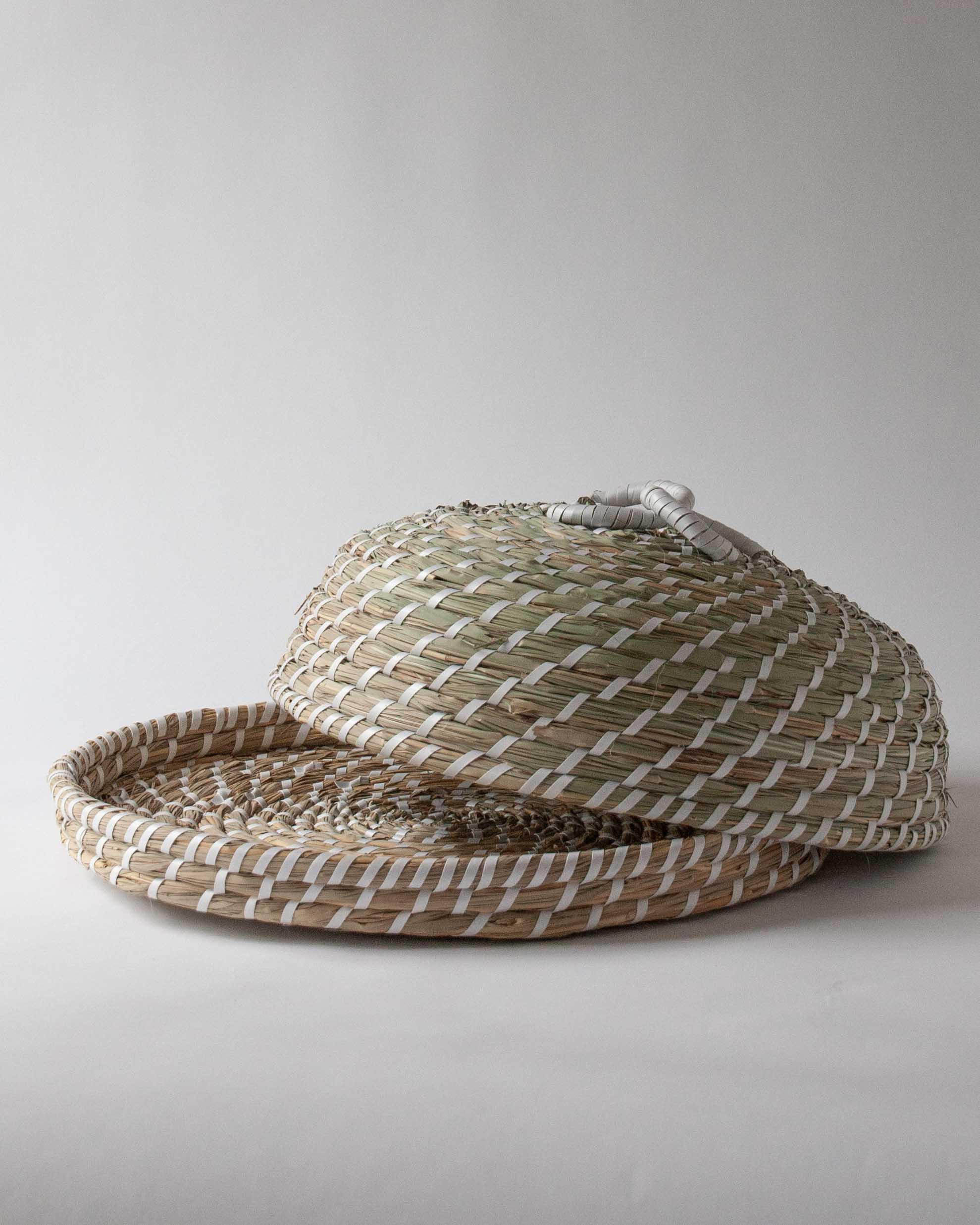 Hand woven from seagrass this luxury food cover cloche dome | Anboise