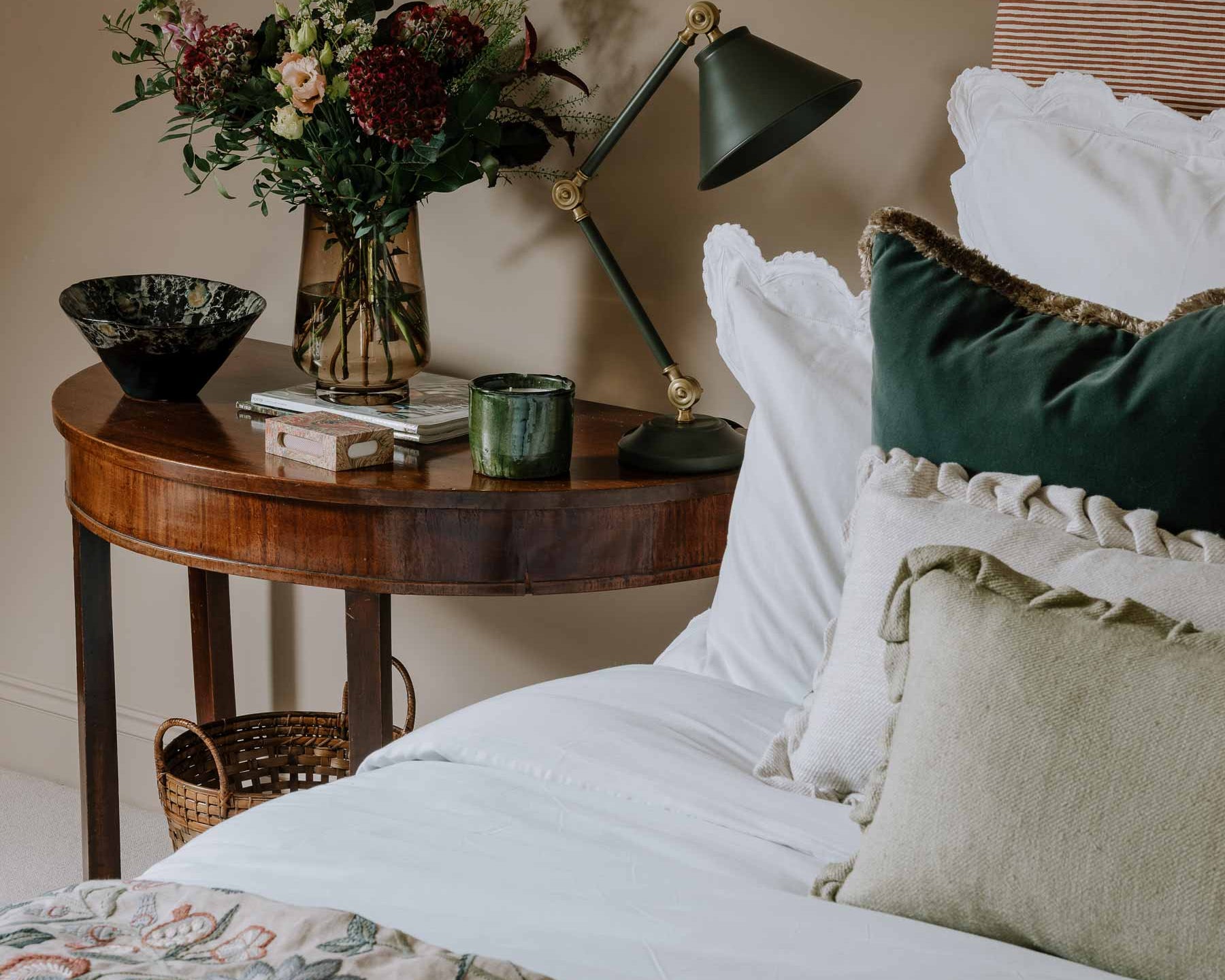 Embroidered luxury quilt styled on bed – Anboise