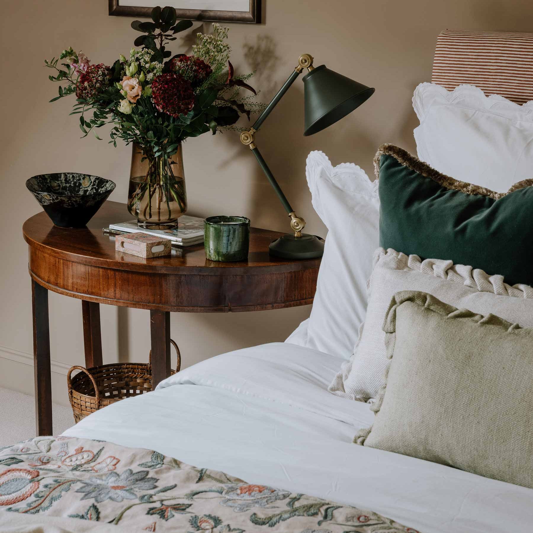 Embroidered luxury quilt styled on bed – Anboise