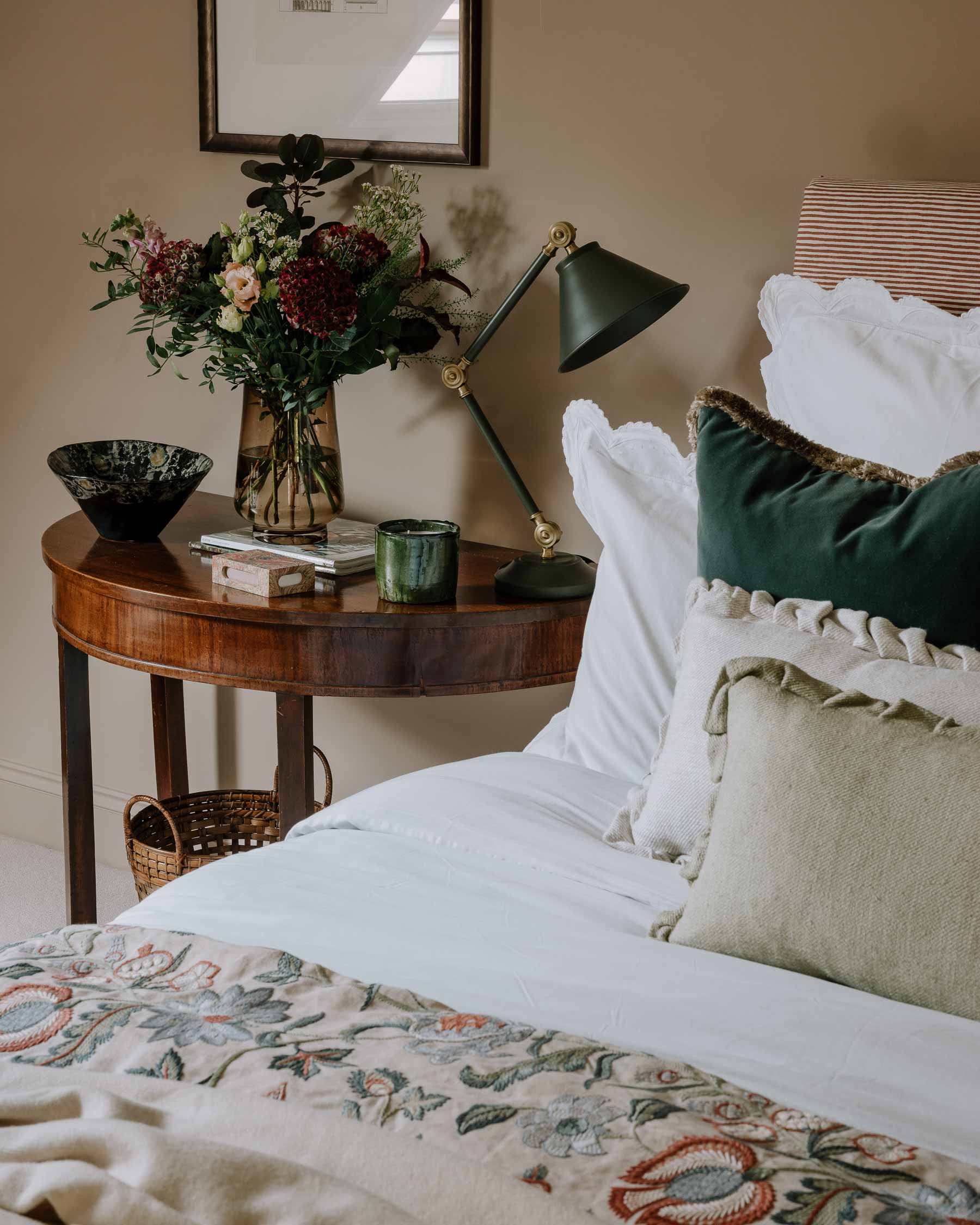 Embroidered luxury quilt styled on bed – Anboise