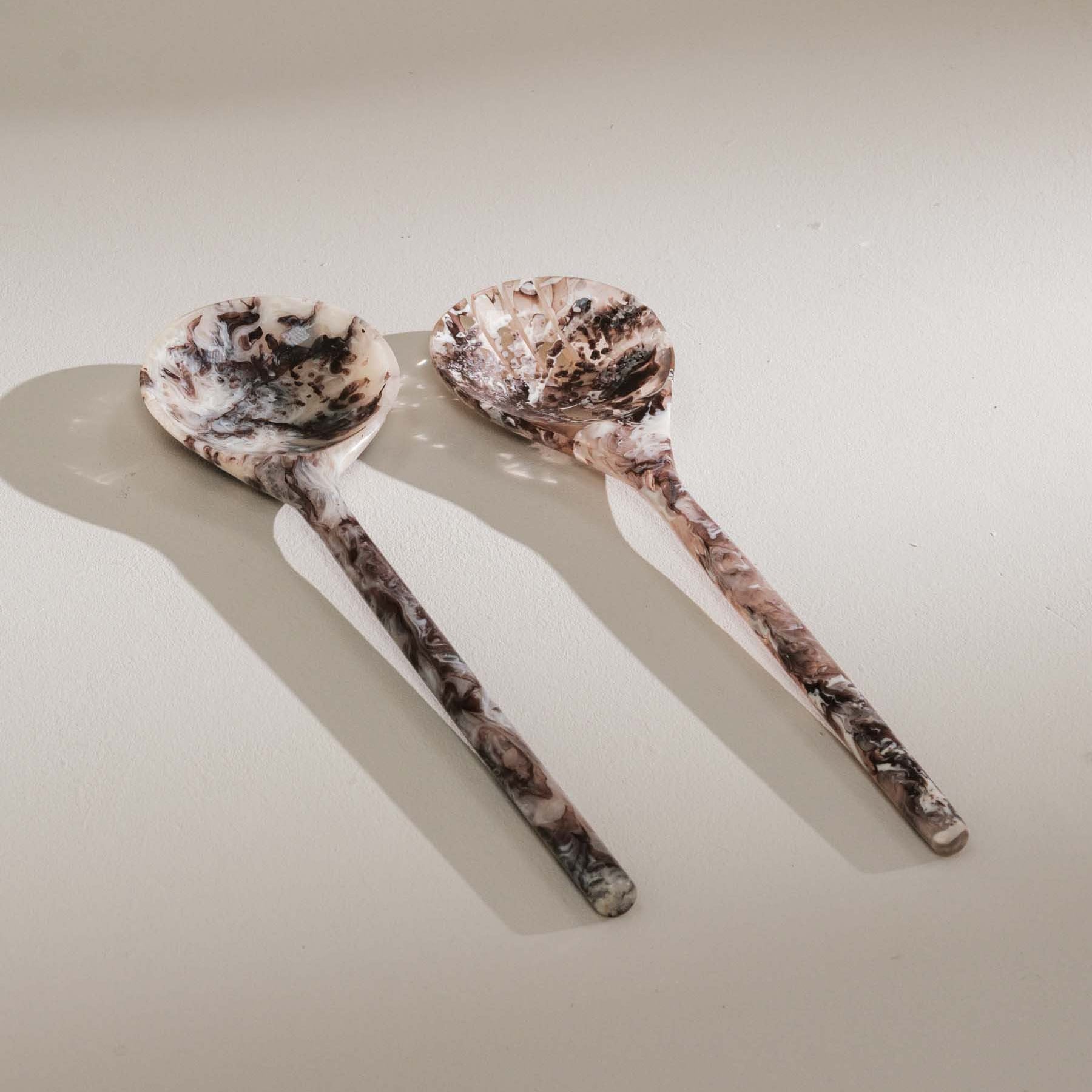 Handcrafted resin serving utensils with graphic contrast - Anboise