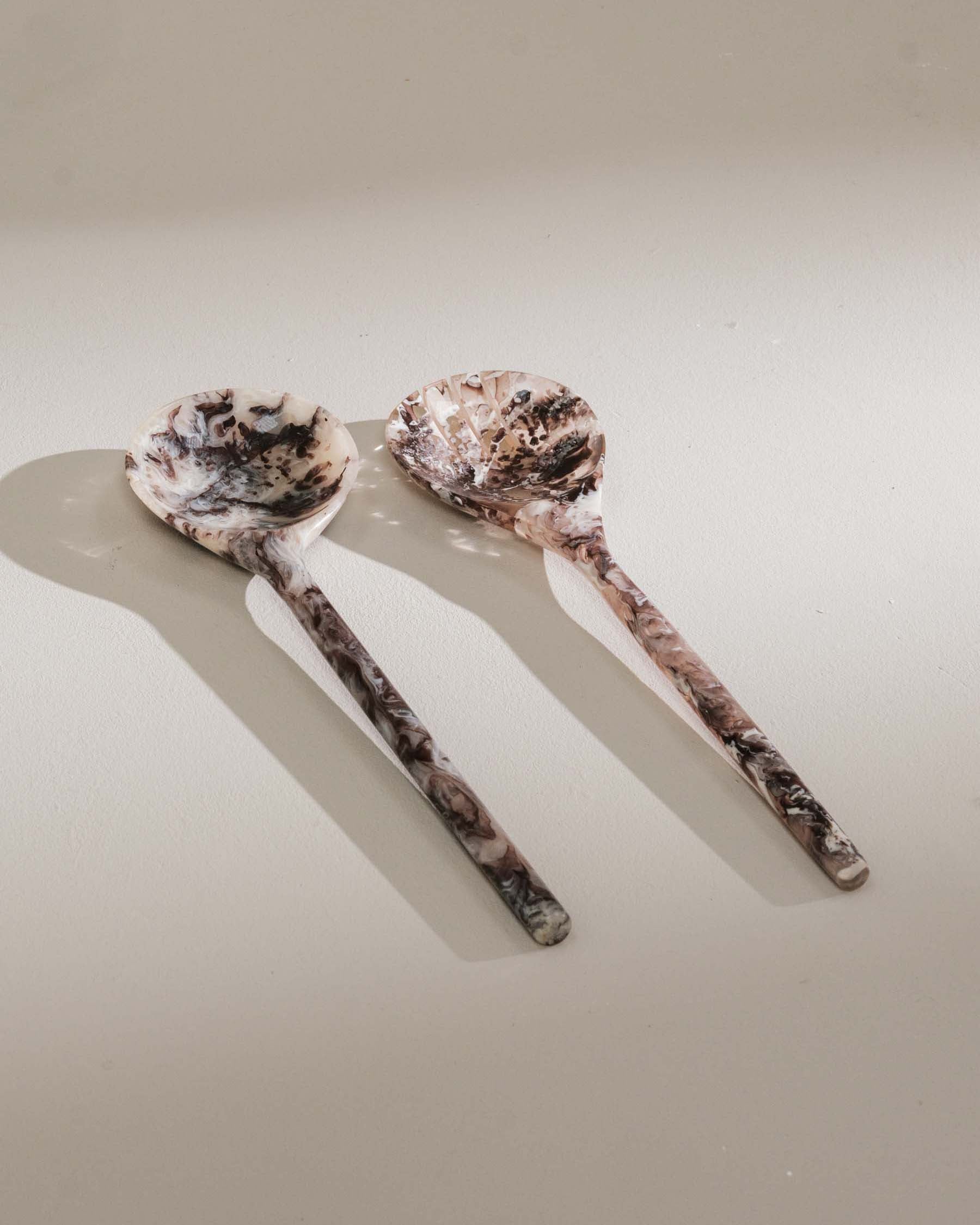 Handcrafted resin serving utensils with graphic contrast - Anboise