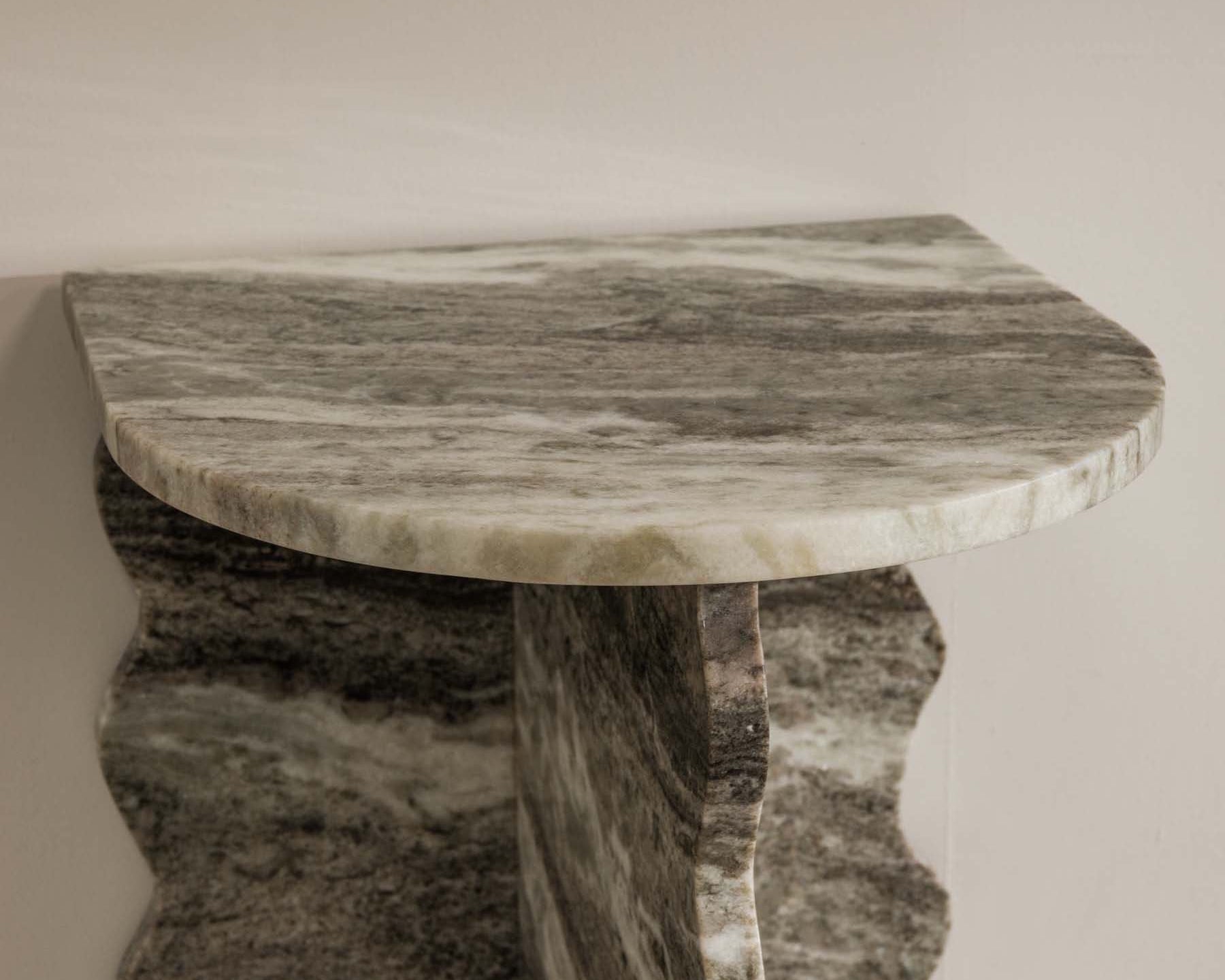 Close‑up of scalloped marble base and natural veining - Anboise