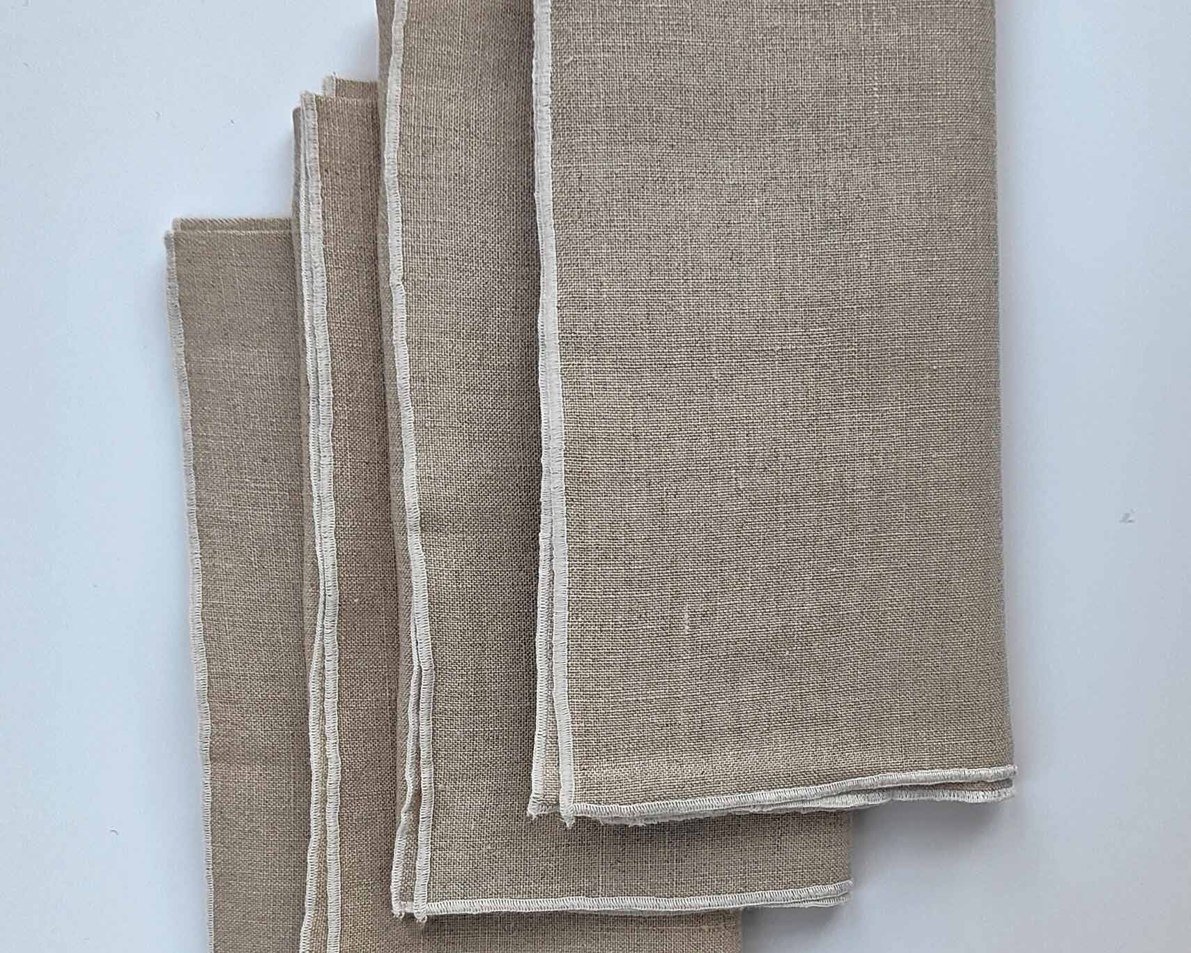 With their subtle embroidered edge, the luxury Georgia linen napkin | Anboise Tableware