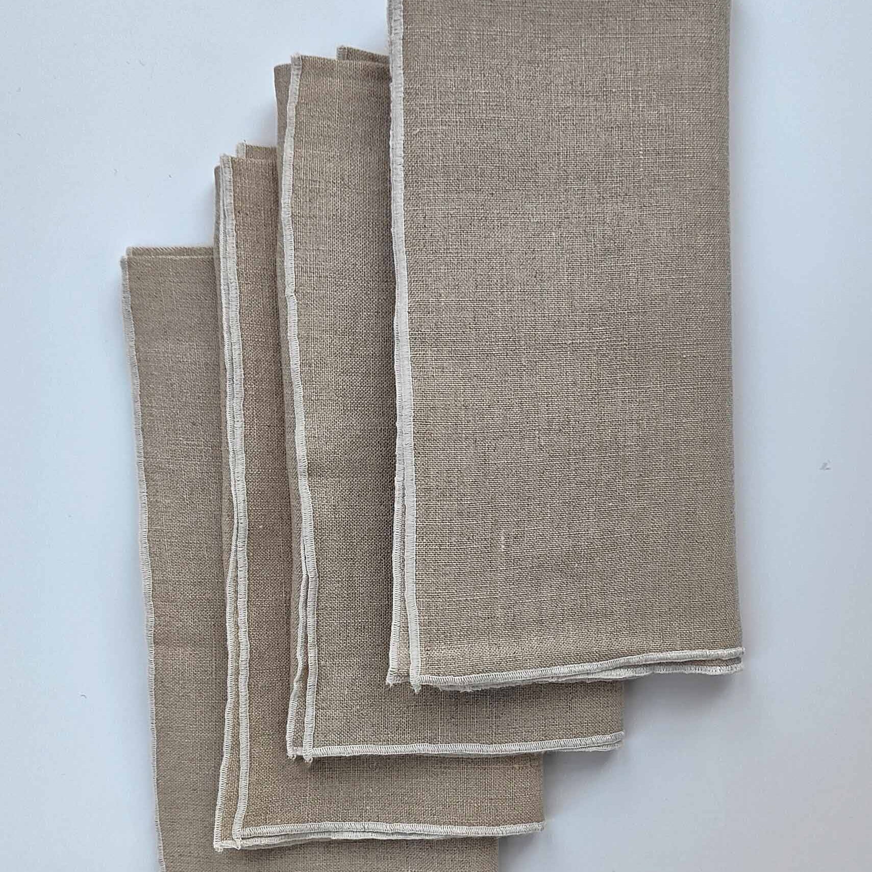 With their subtle embroidered edge, the luxury Georgia linen napkin | Anboise Tableware