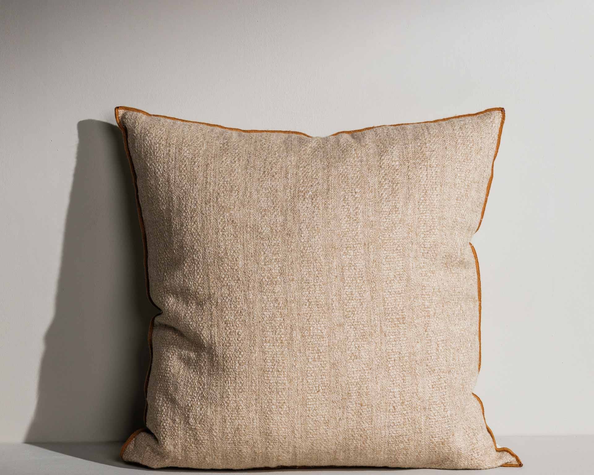 Katie woven cream cushion with contrast piping – Anboise