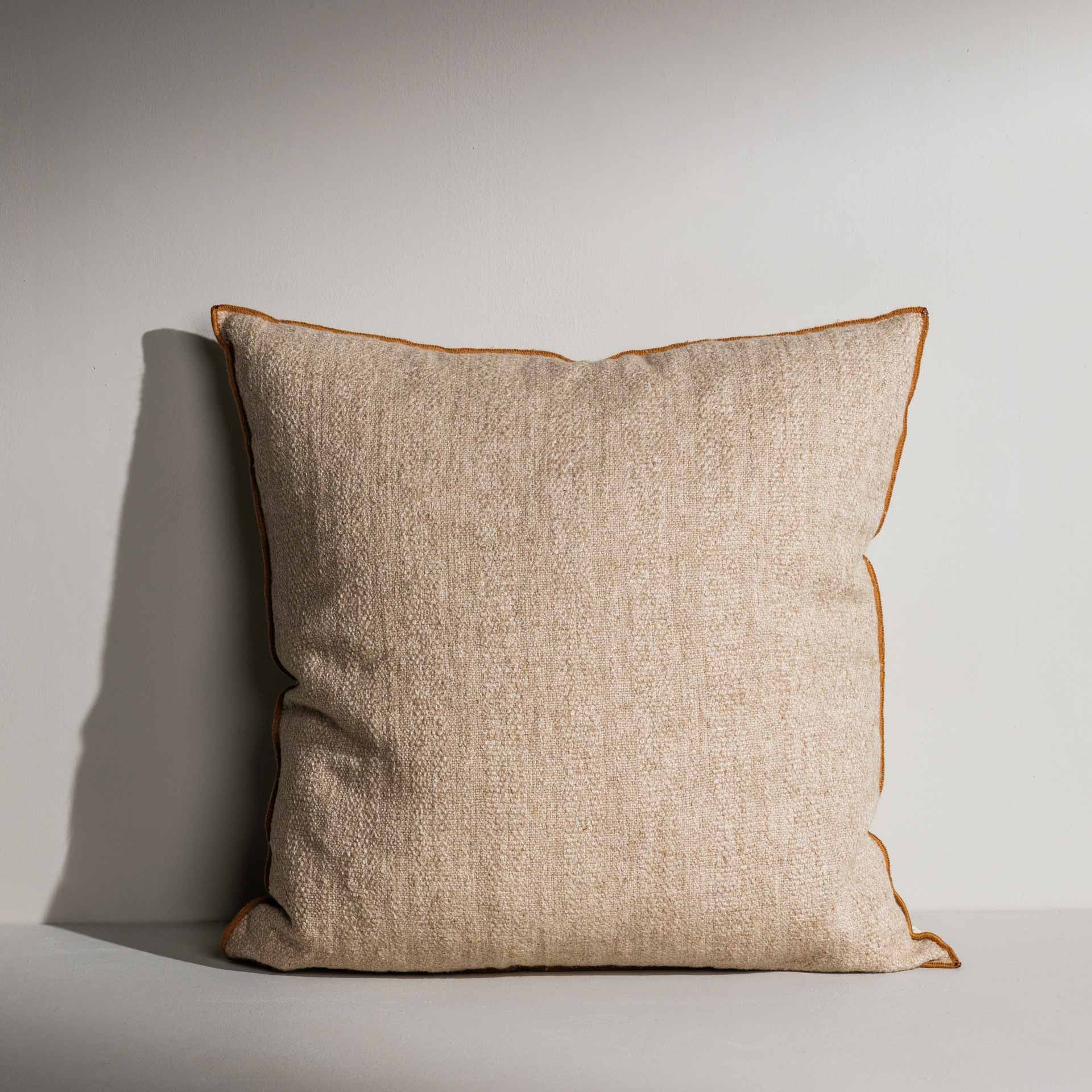 Katie woven cream cushion with contrast piping – Anboise