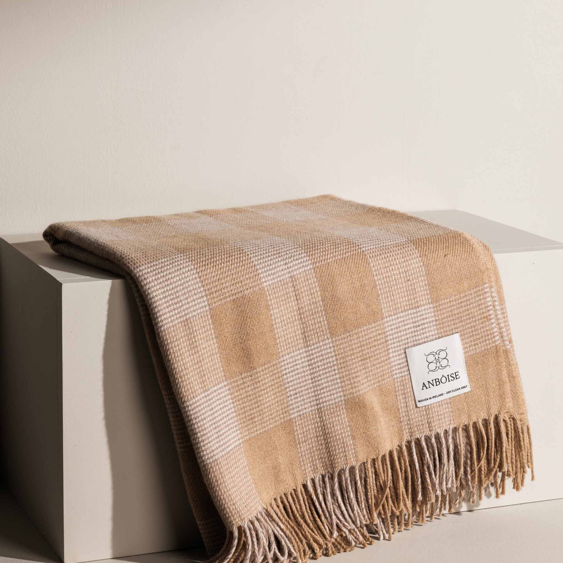 Cream Merino throw with subtle check and fringe detailing - Anboise