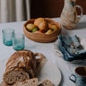 Decorative rattan bowl on dining table - Anboise