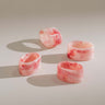 Zariah pink resin napkin rings – set of four – Anboise
