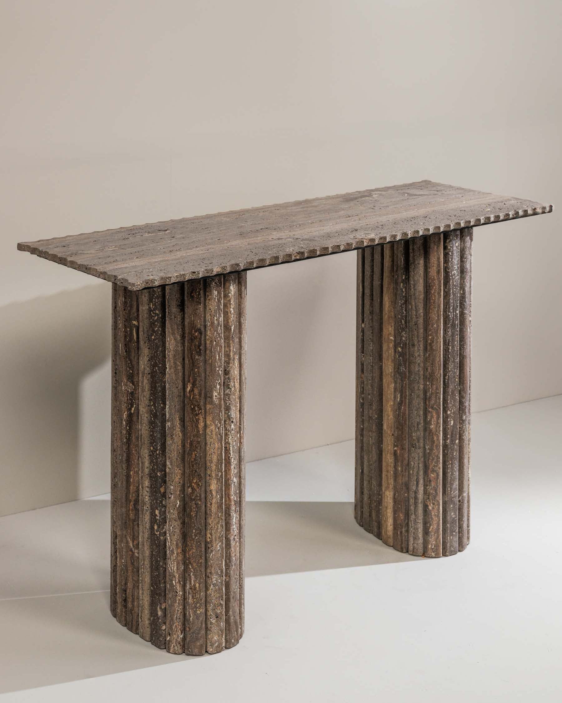 April console table crafted from dark grey Travertine with dramatic veining – Anboise