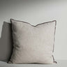 Matilda woven off‑white cushion with contrast piping – Anboise