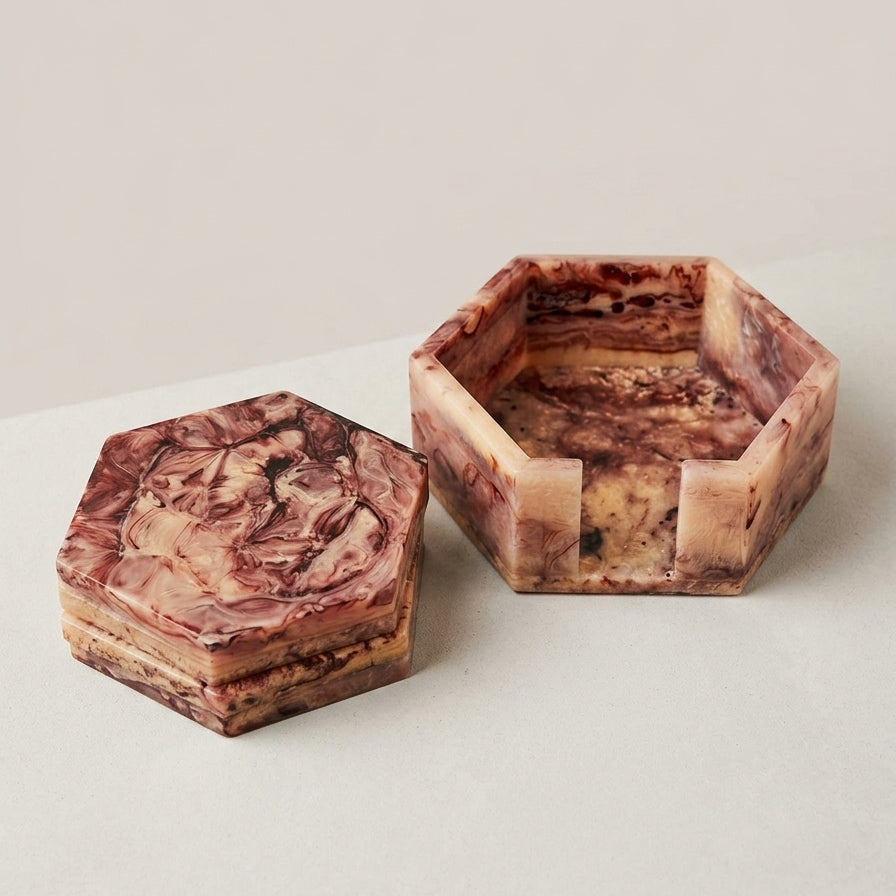 Close‑up of marbled resin coasters in hexagonal shape | Anboise