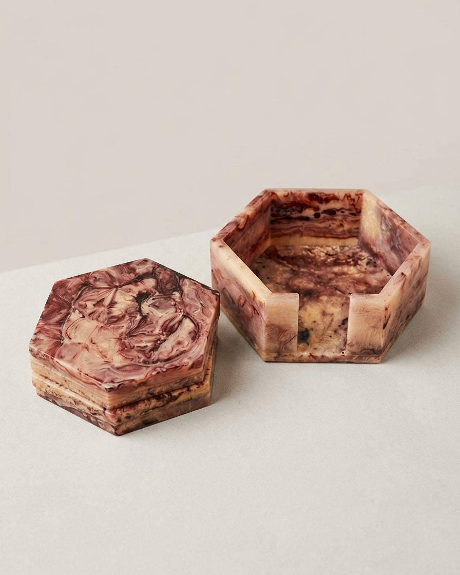 Close‑up of marbled resin coasters in hexagonal shape | Anboise