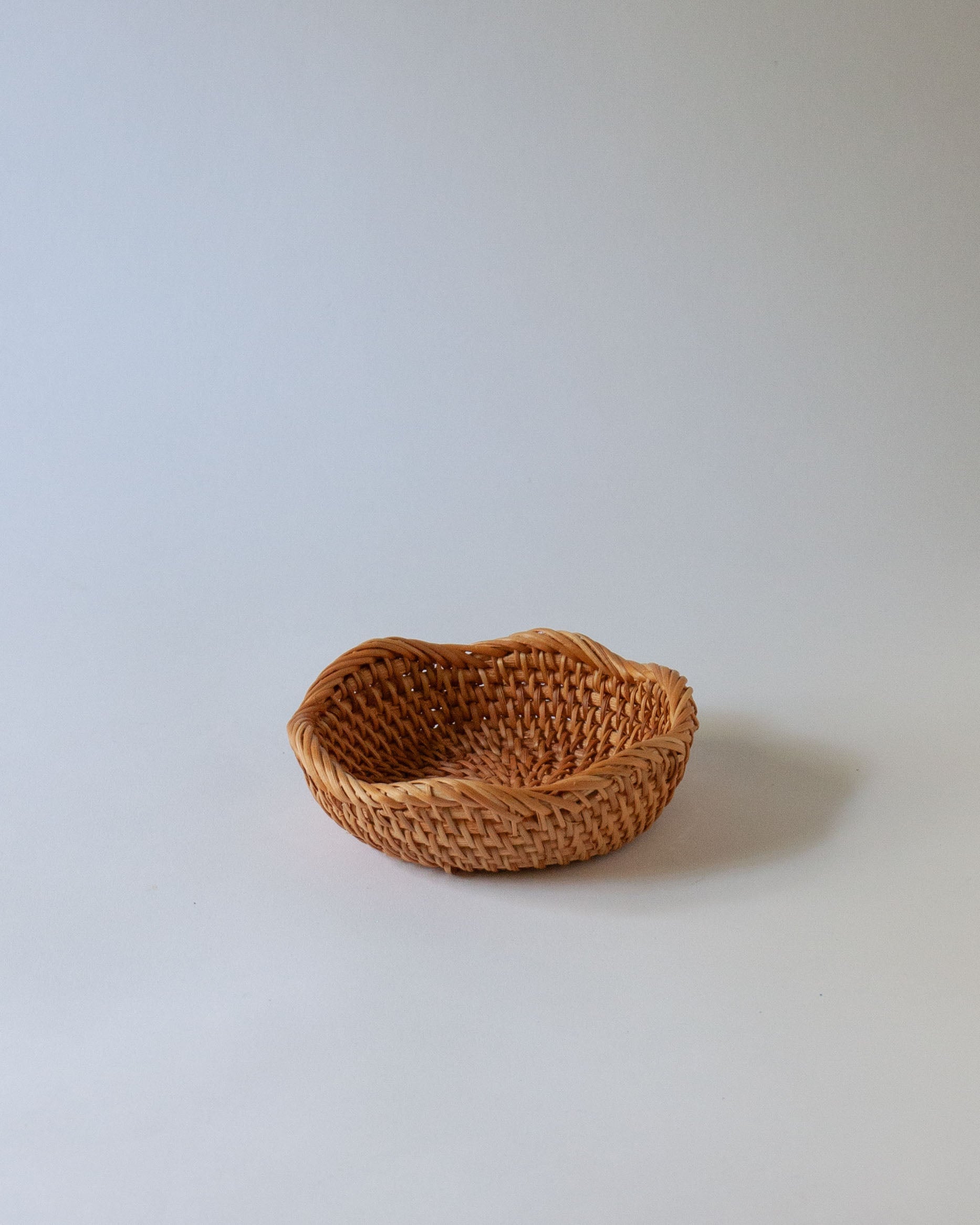 Piatto in rattan smerlato Lena