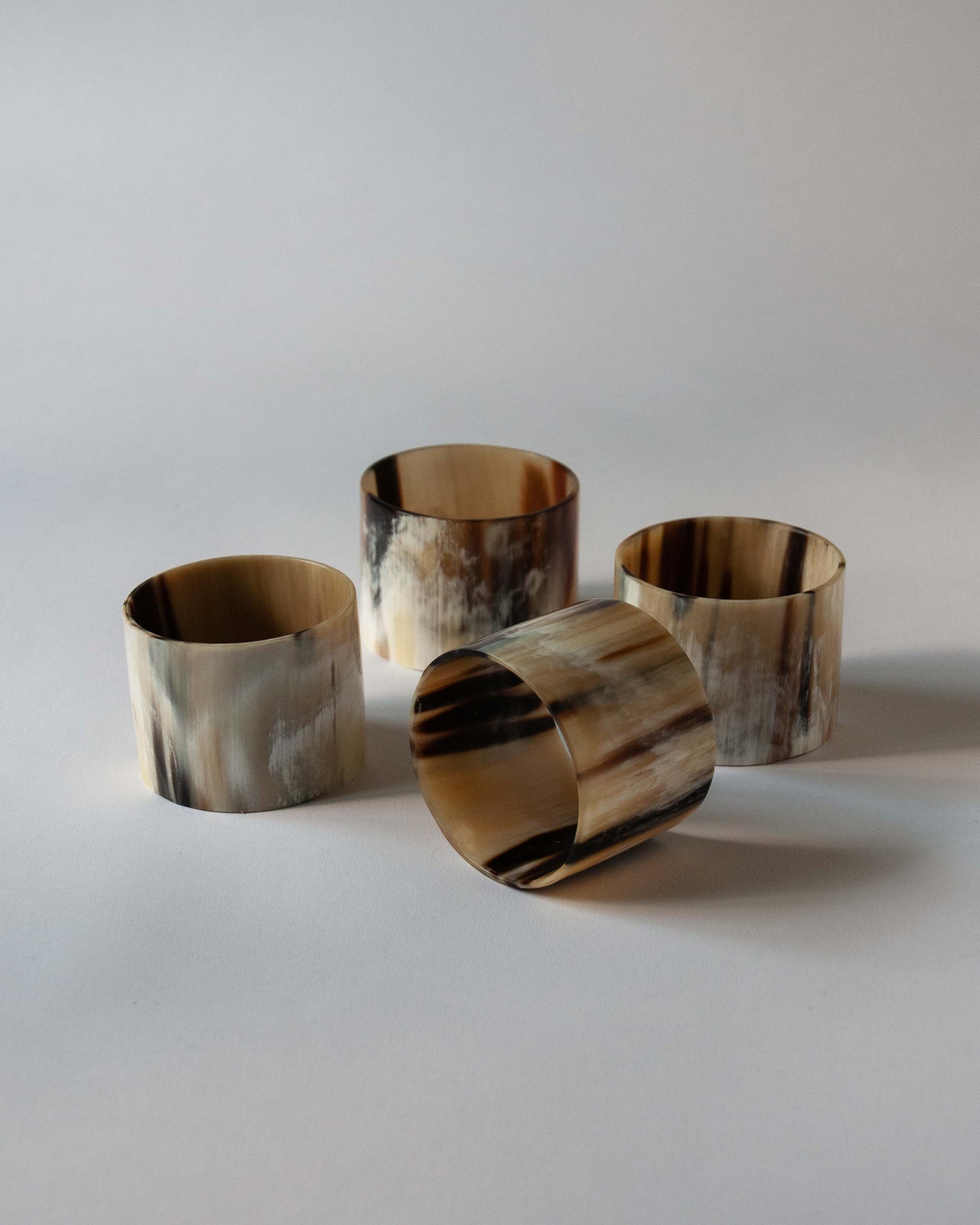 BRUNELLO CUCINELLI Set of six horn napkin rings