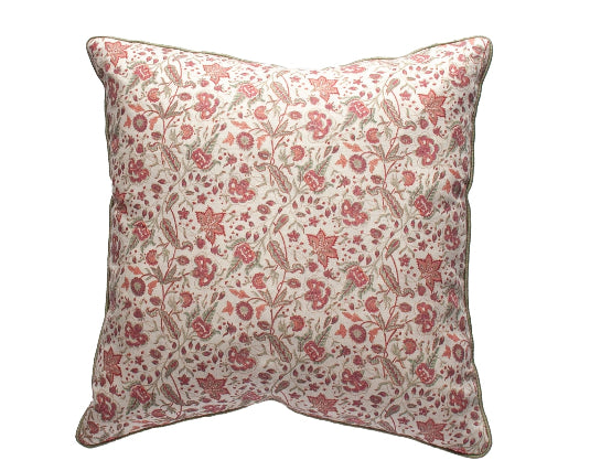 A square cushion with a floral pattern in beige and red colors.