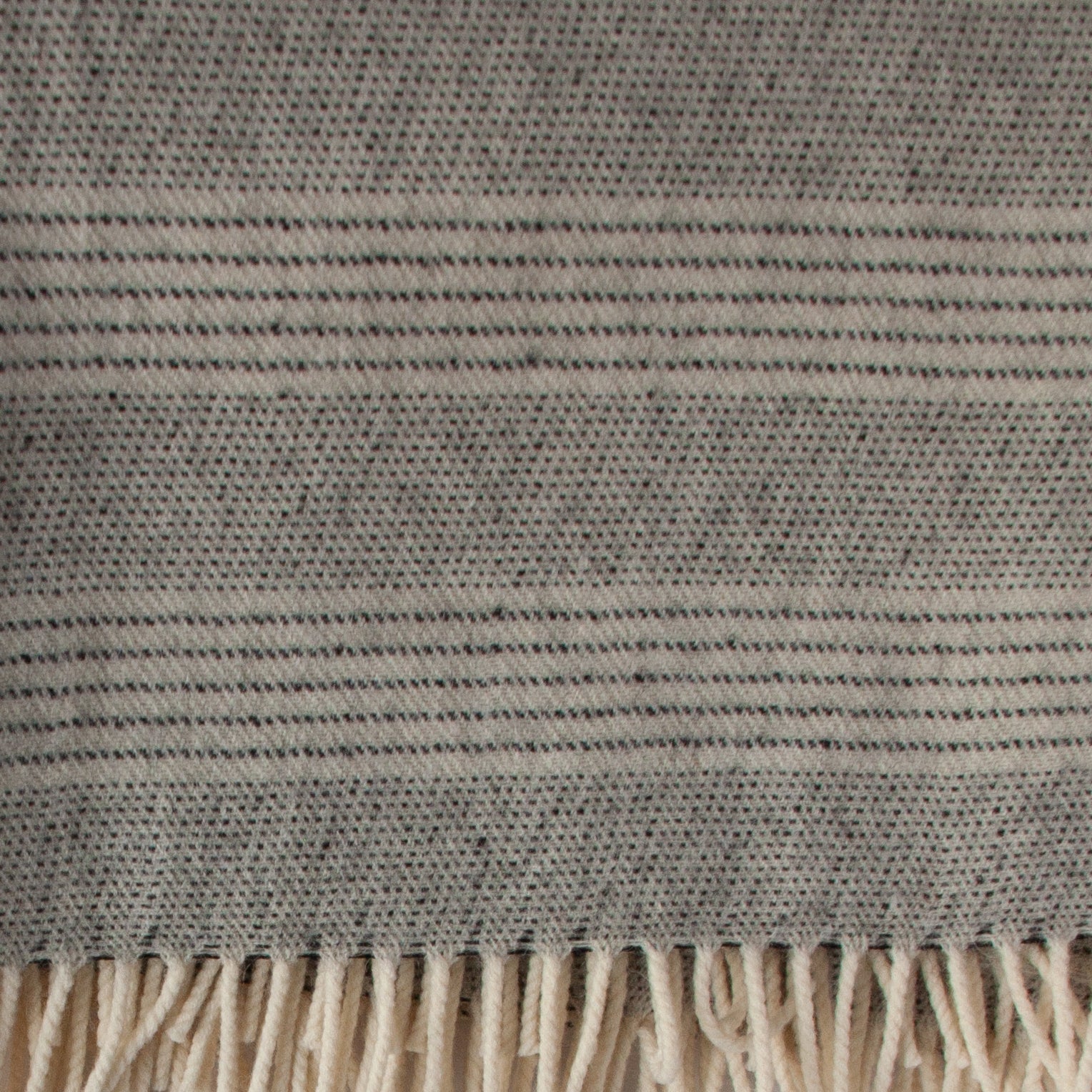 Hypoallergenic Alpaca–Merino throw draped over sofa – Anboise