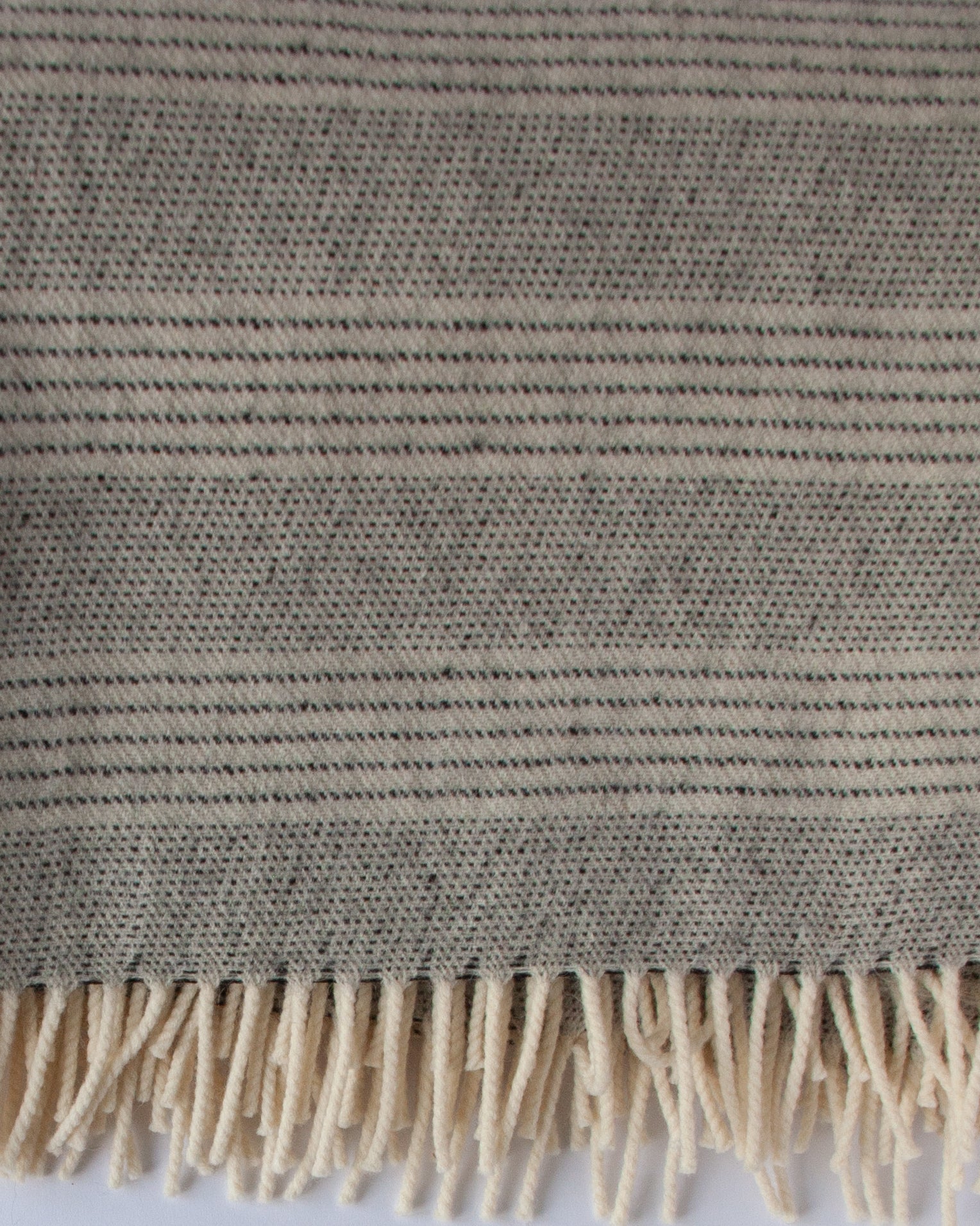 Hypoallergenic Alpaca–Merino throw draped over sofa – Anboise