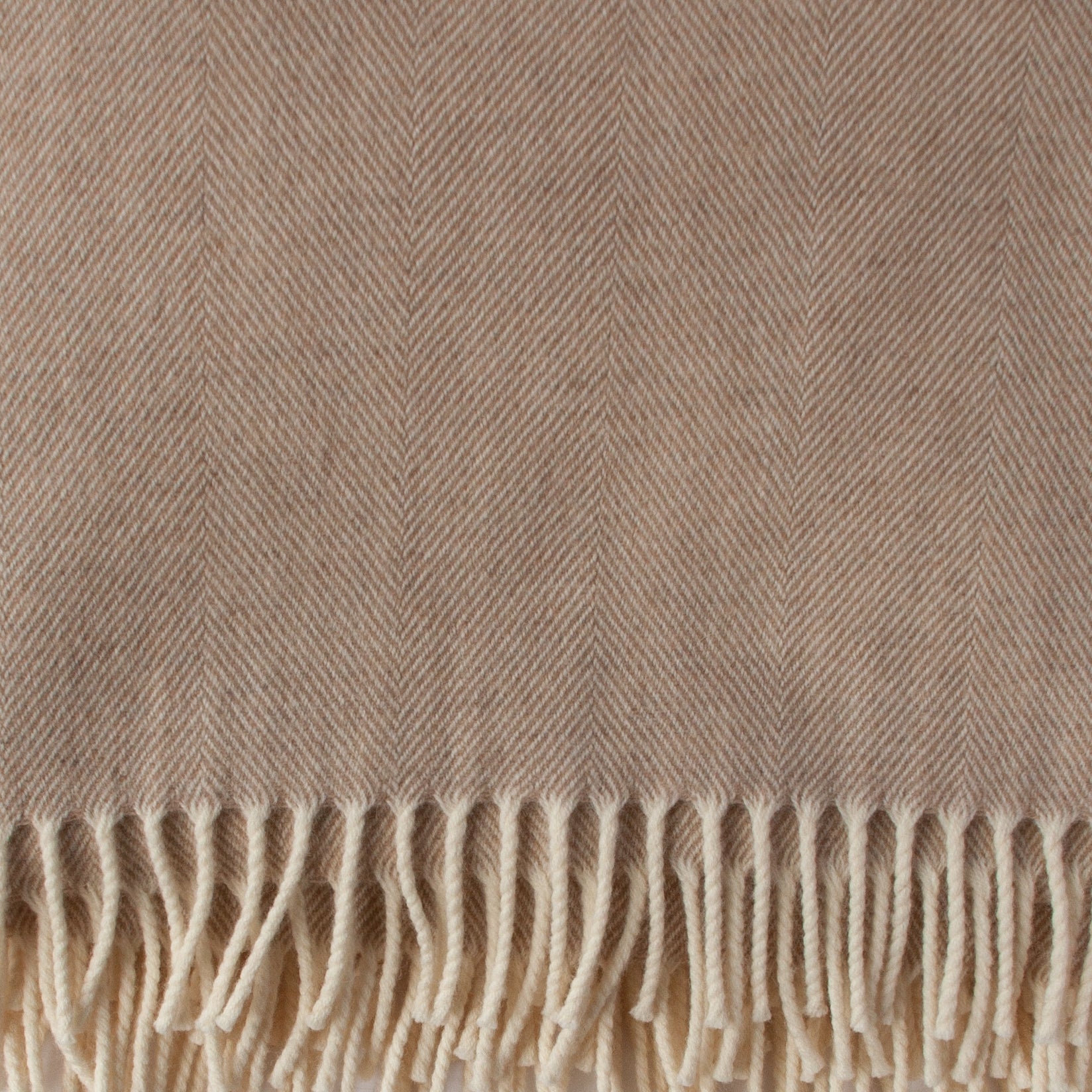 Close‑up of cream Merino weave and soft texture - Anbosie
