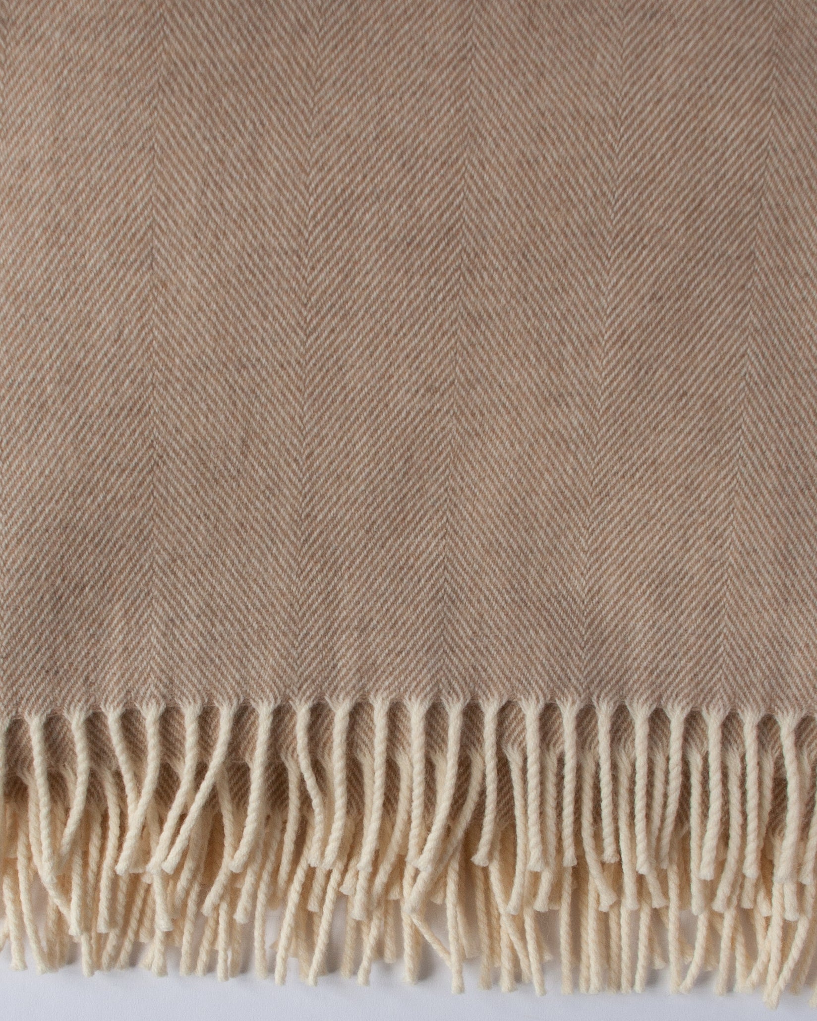 Close‑up of cream Merino weave and soft texture - Anbosie
