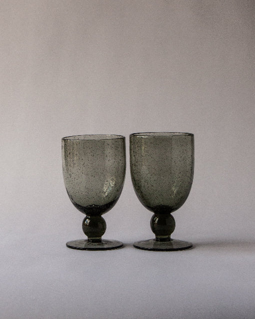 Close‑up of bubbles within handcrafted goblet - Anboise