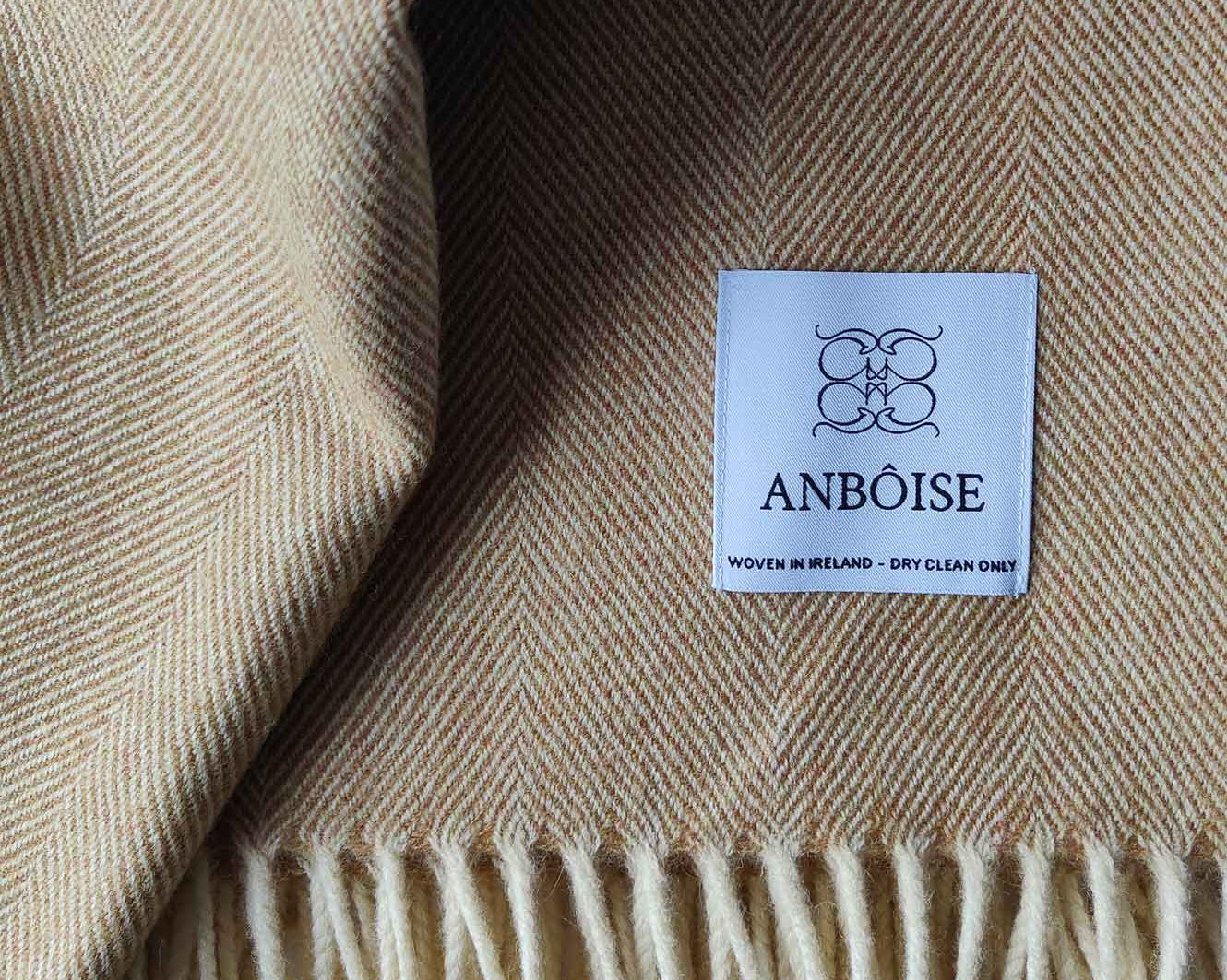 Close‑up of mustard Merino weave and soft texture - Anboise