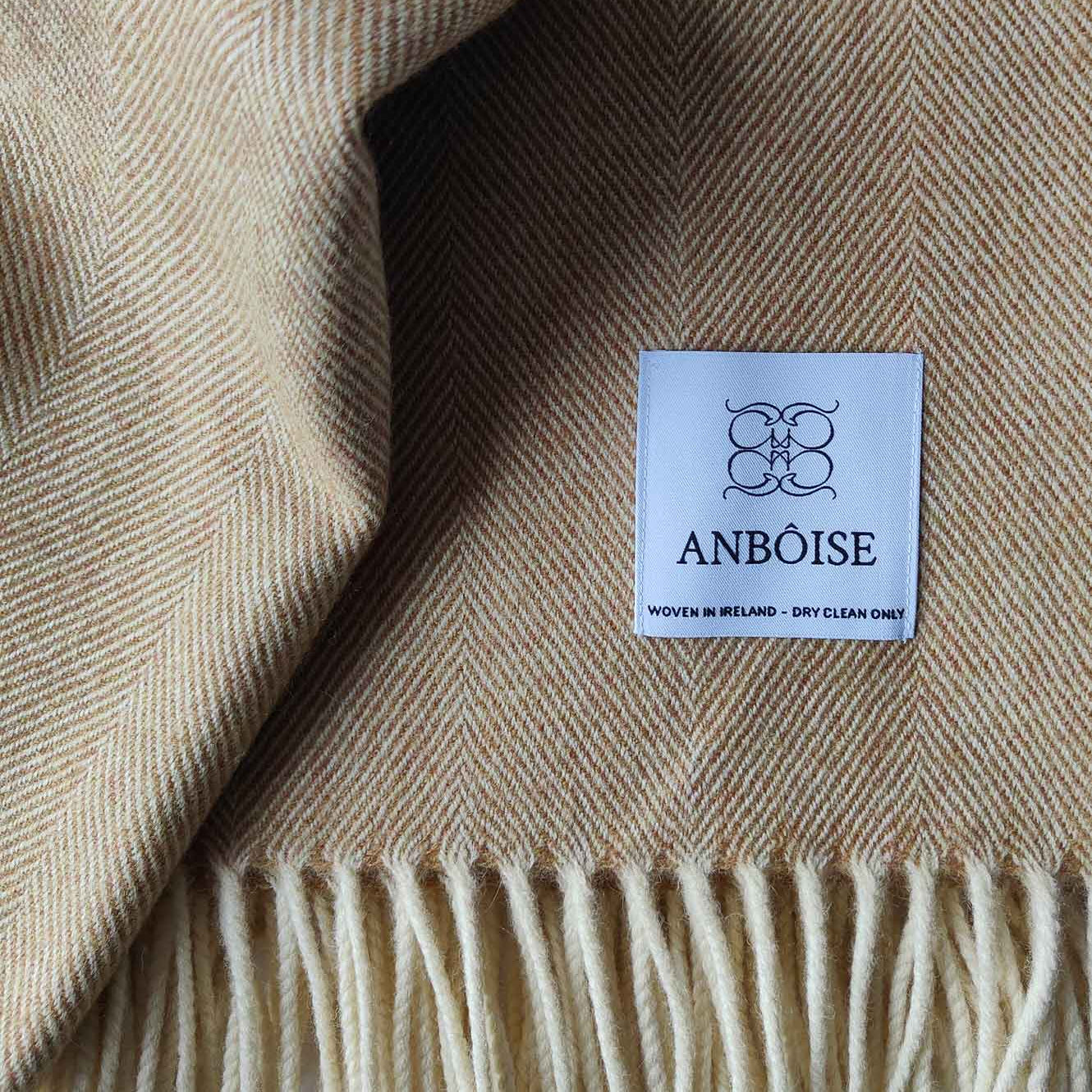 Close‑up of mustard Merino weave and soft texture - Anboise