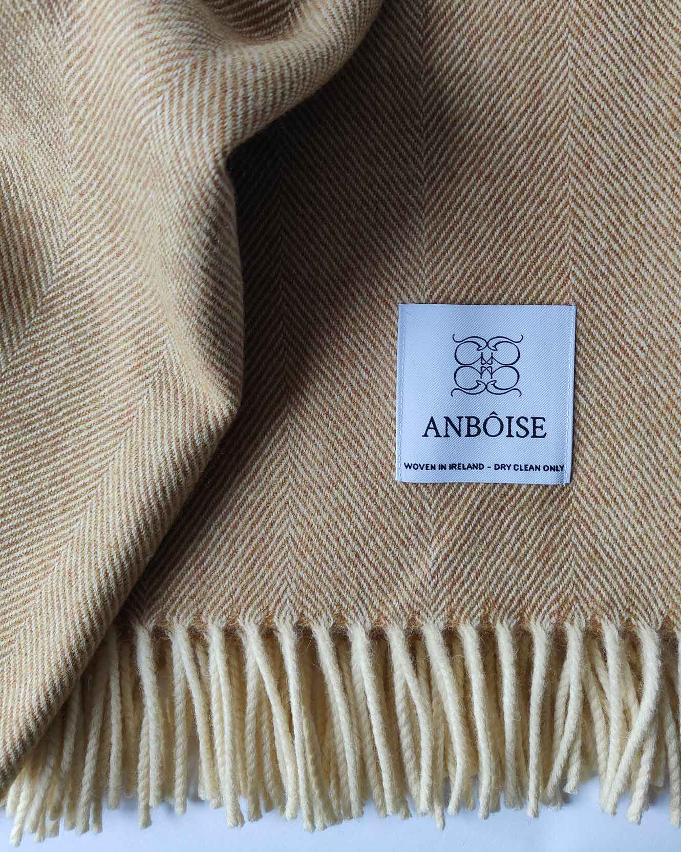 Close‑up of mustard Merino weave and soft texture - Anboise